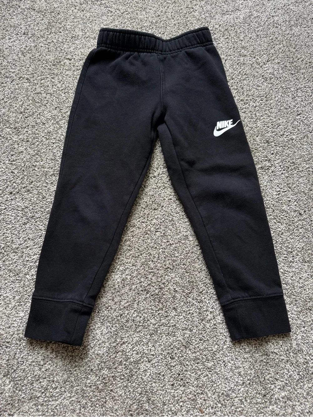 Nike Kids Black Joggers with White Swoosh